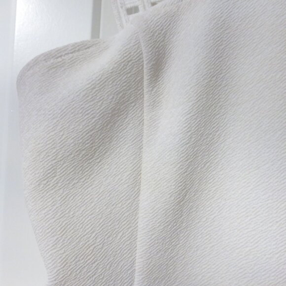 BEBE white peplum top with thick straps and small cut out details - Picture 9 of 13